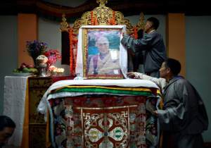 Tibetans arrange the portrait of Dalai Lama during a function organised to mark the 82nd birthday celebration of Dalai Lama in Lalitpur, Nepal July 6, 2017. REUTERS/Navesh Chitrakar